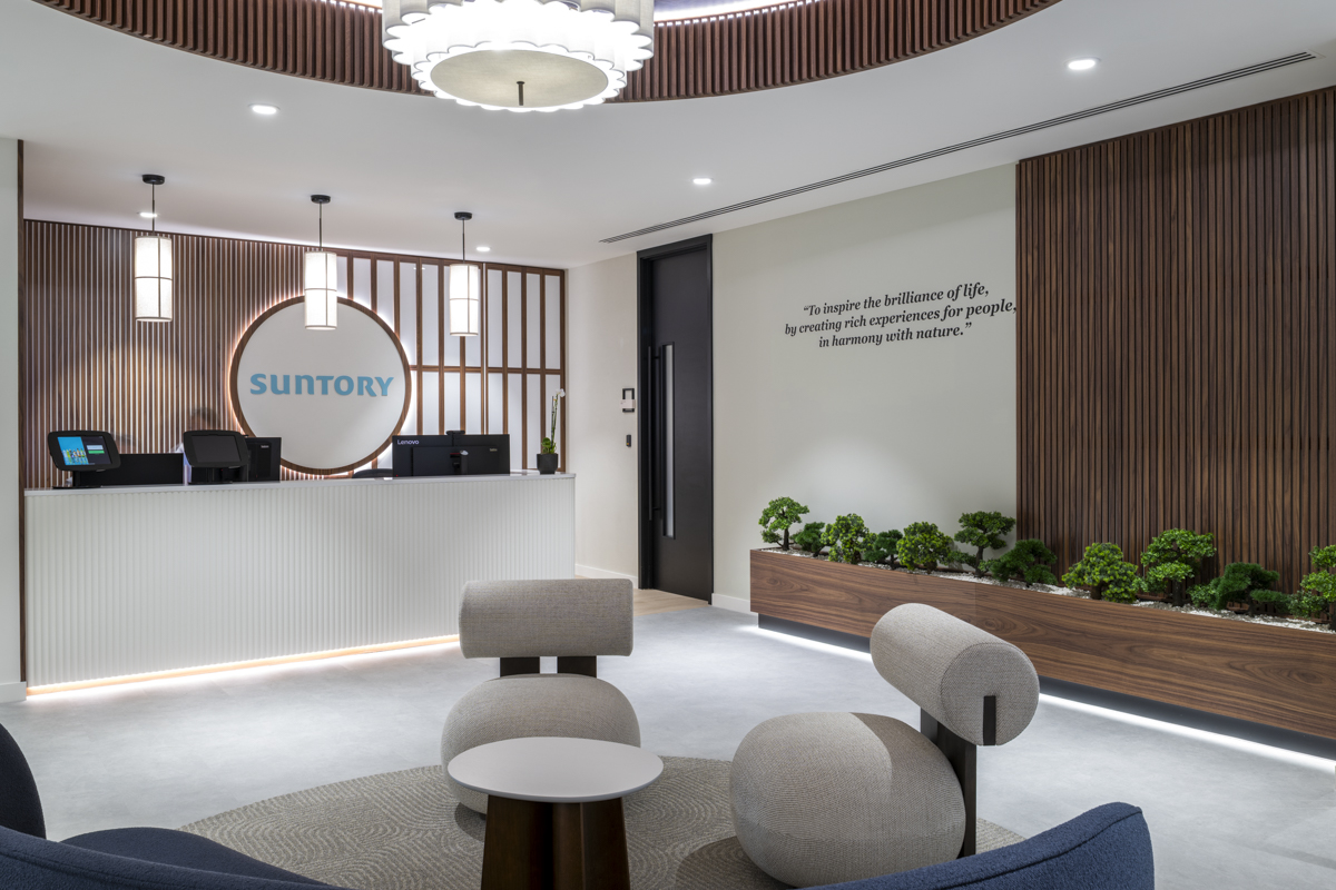 apanese-inspired reception with natural light and curved wood finishes – office design photography
